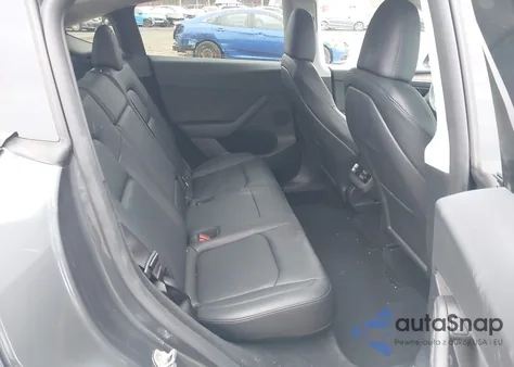 2023 Tesla Model Y Performance Dual Motor All-Wheel Drive z USA, uszkodzony, nr VIN 7SAYGDEF4PF841398